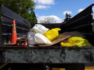 Dump Truck filled with litter.