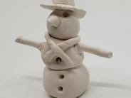 Snowman made out of white clay