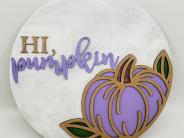 Wooden plaque that reads Hi, Pumpkin