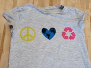 T-shirt with peace symbol, heart shaped earth and a recycle symbol