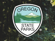 Oregon State Parks logo against a forest background