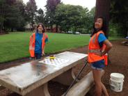 Cleaning picnic tables at Tualatin Community Park