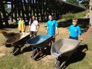 Moving Fibar and mulch at Tualatin Community Park
