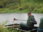 Volunteer removing litter