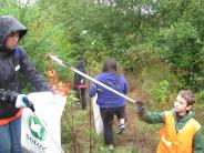 Volunteers removing litter