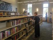 Volunteer Sprucing Up Tualatin Library