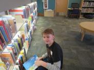 Volunteer Sprucing Up Tualatin Library