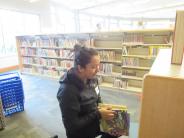 Volunteer Sprucing Up Tualatin Library