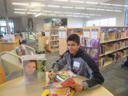 Volunteer Sprucing Up Tualatin Library