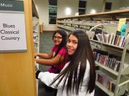 Volunteers shelving books