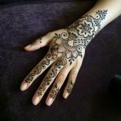 Hand with henna designs