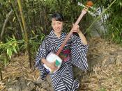 Musician Yumi Torimaru holding a shamisen