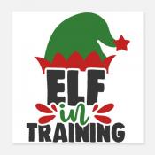 A red and green Santa's elf cap perched on top of the text "Elf in Training"