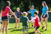 kids and camp counselors playing