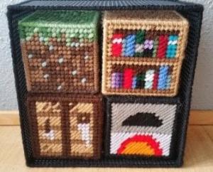Photo of blocks made from plastic canvas and yarn.
