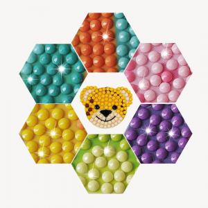 Photo of tiger face made with colorful gems.