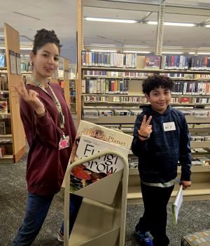 A tween volunteer and teen mentor at a previous Tween Takeover.