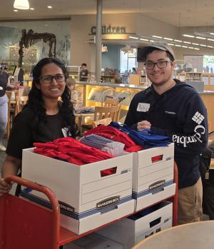 Photo of Maya and RIley, volunteers.