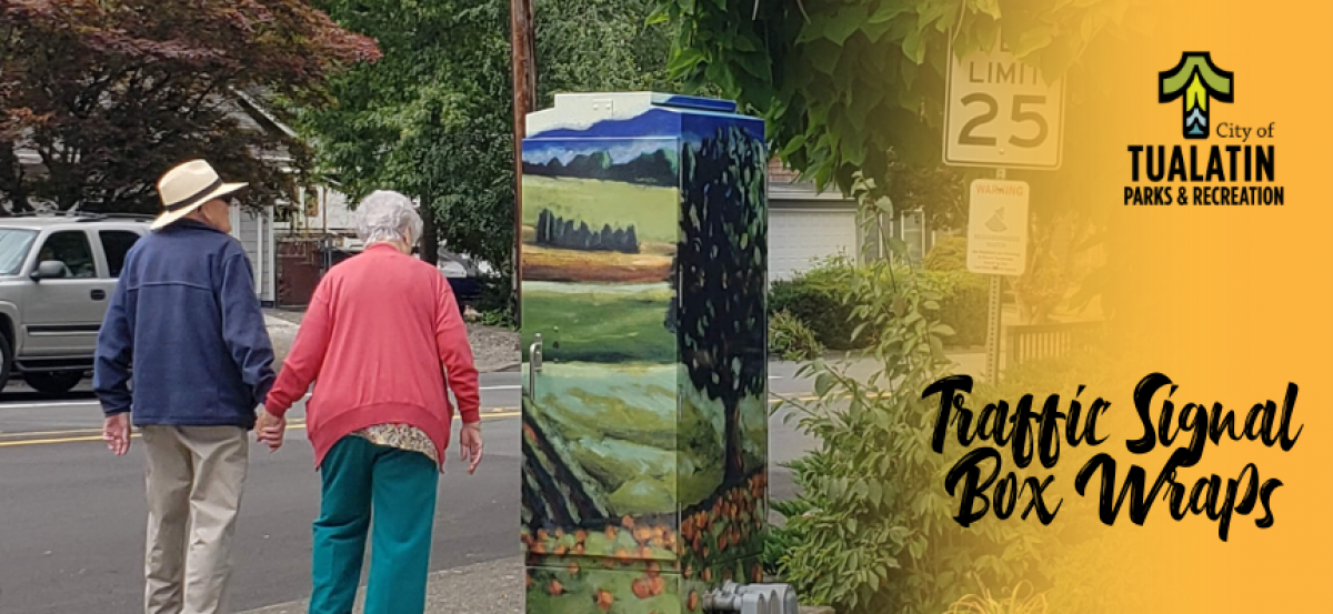 image of a couple walking past a traffic signal box that has been wrapped with art